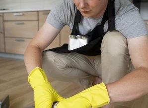 man-servant-cleaning-house